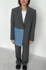 Oversized jacket with blue denim pocket, light grey